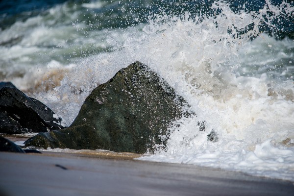 Telephoto reach at 400mm allowed me to capture this crashing wave from a safe distance. And a super-fast 1/4000 shutter speed perfectly froze all the water in motion. 1/4000 F6.3 ISO 320, Sony A850.
