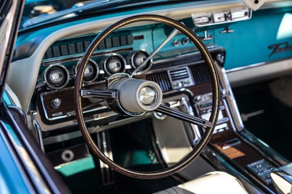The circular polarizer helps keep colors crisp and cut glare and reflections on the steering wheel and dashboard of a classic Thunderbird seen through the 50mm F1.4 DG HSM | Art at 1/320 F2.8 ISO 400 on a 6D. 