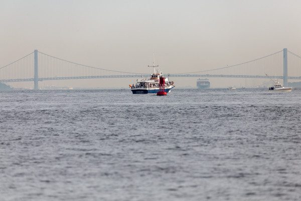But the ability to zoom in and out and lock focus at different lengths, can be very helpful; which adds to the versatility. Here's the same boat, bridge, and buoy at the shortest focal length. 1/2000 F6.3 ISO 800 at 150mm on the 6D.