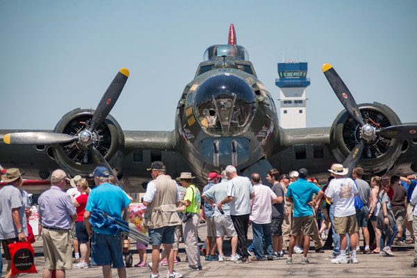 © 2016 Jim Koepnick | Crowds in Warbirds area at Sun n Fun 2016 in Lakeland, Florida. Canon 70D camera with Sigma 18-300 lens.