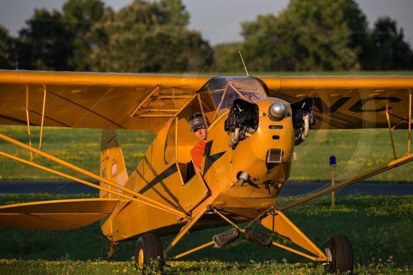© 2016 Jim Koepnick The long reach of the Sigma 150-600 Sport allows photographing a Cub taxiing from a safe distance. Sigma 150-600 Sport at 450mm; Canon 1DX; 1/30 sec (on tripod) at f10; ISO 100.