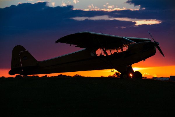 © 2016 Jim Koepnick | In profile at sunset, the Piper Cub is an aviation classic. Sigma 150-600 Sport at 250mm; Canon 1DX; 1/160 sec at f9; ISO 200.